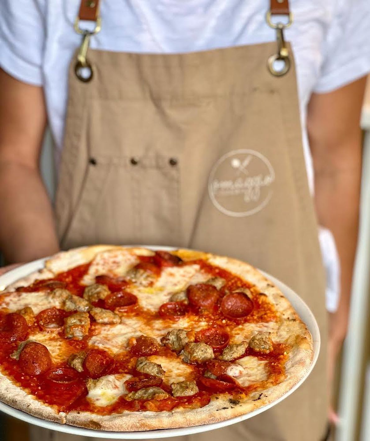 Pizzeria Omaggio pays tribute to the art of pizza making and relies entirely on fresh, quality ingredients. Expect to enjoy an authentic, Italian experience each and ever time.